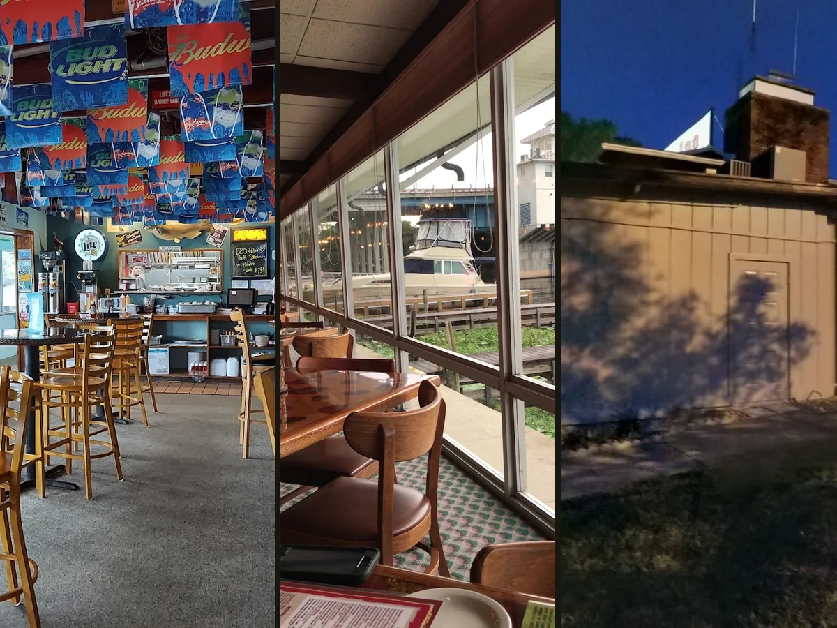 Riverfront dining room with tables near large windows.